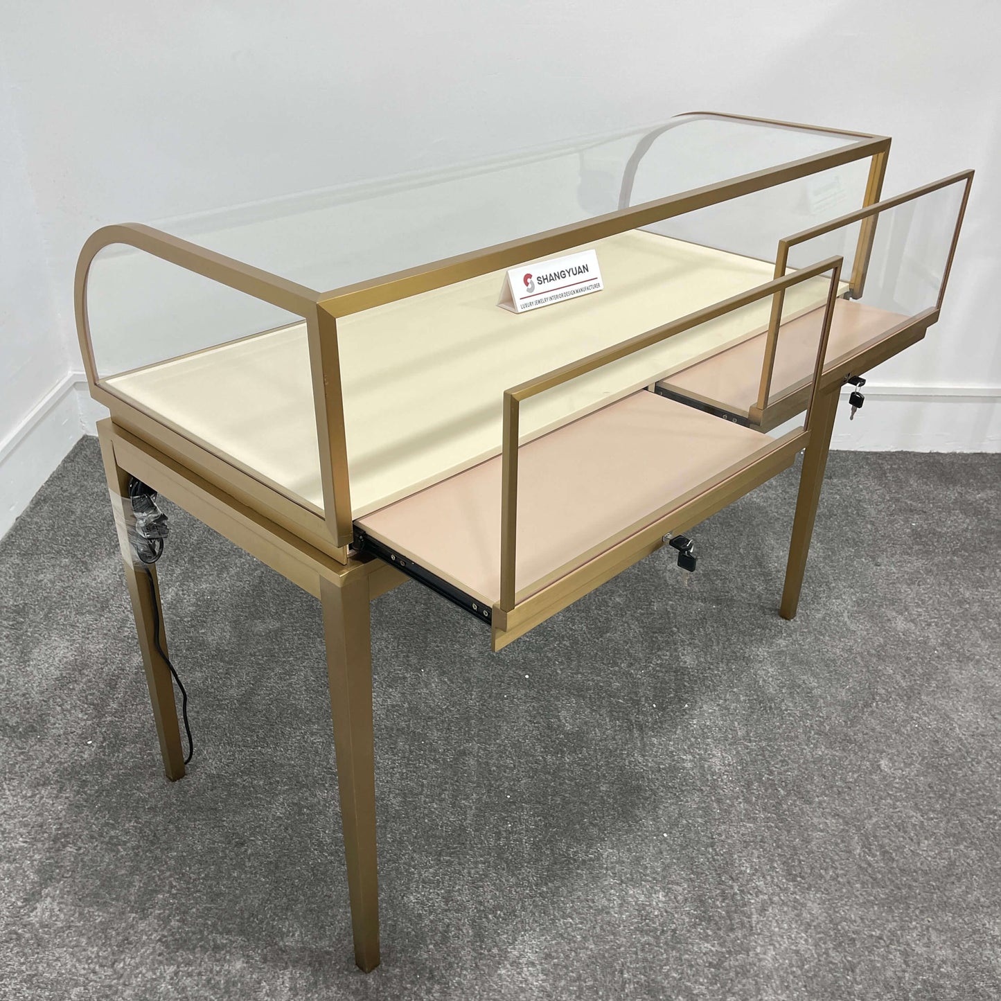 Sophisticated Gold Jewelry Display Counter
